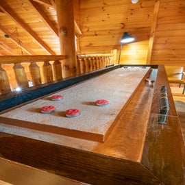 Altitude Adjustment's shuffleboard table