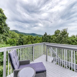 Tranquility Skies' deck with stunning views