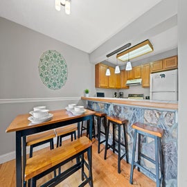 Windy Oaks Condo's kitchen and dining area