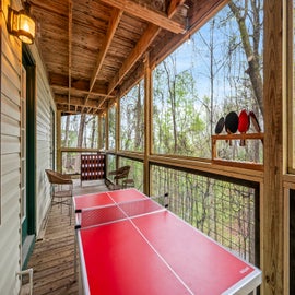 Smoky Mountain Game Den's deck with ping pong table