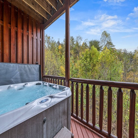 Bear Essentials Lodge's bubbling hot tub