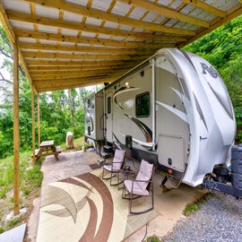 JB's Heavenly Hideaway's exterior with the new metal roofing