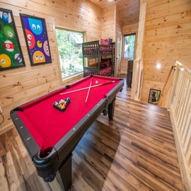 Cozy Cub Cabin's pool table at the game loft