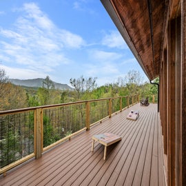 Mountain Vibes' spacious decks with mountain views!