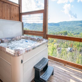 Hilltop Hideaway's bubbling hot tub