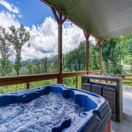 Sunrise Chalet's bubbling hot tub