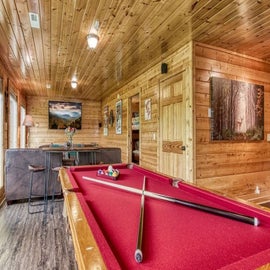 Pine Top Paradise's game/movie room