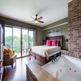 Penthouse Paradise's master bedroom with Jacuzzi tub