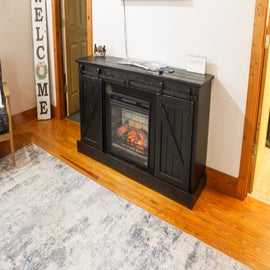 Bear Tracks Lodge's crackling fireplace