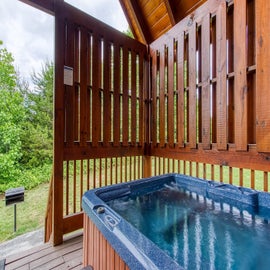 Pinewood Lodge's private hot tub